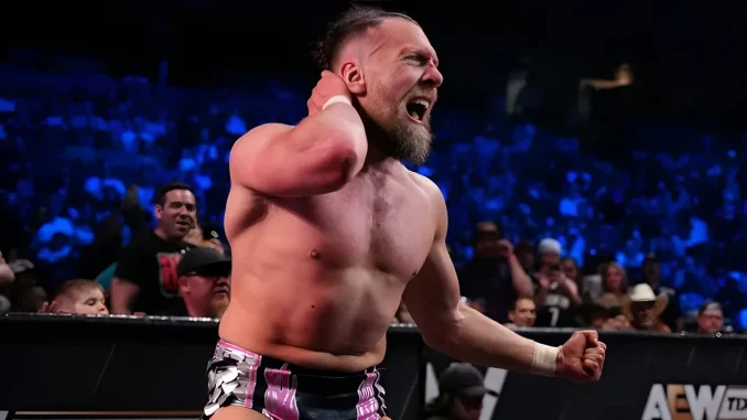 Bryan Danielson hat Schmerzen und greift an seinen Nacken