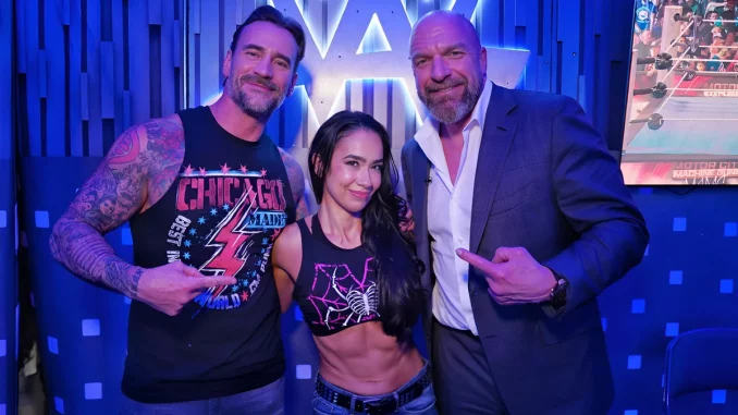 CM Punk, AJ Lee und Triple H im Backstagebereich