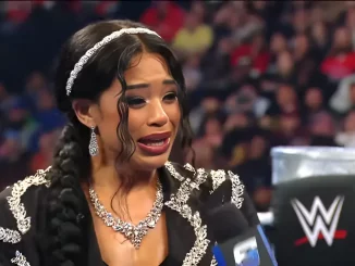 Bianca Belair steht traurig im Ring