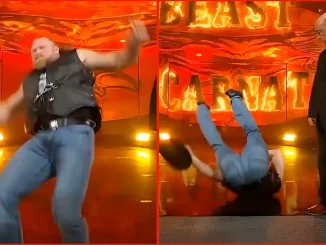 Brock Lesnar stürzt auf der WWE Stage neben Paul Heyman