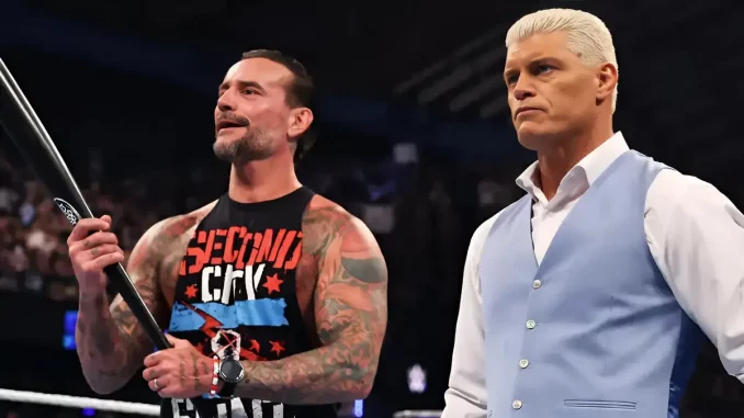 CM Punk (links) mit Baseballschläger in der Hand und Cody Rhodes (rechts) neben ihm
