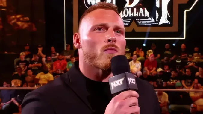 Ridge Holland steht im Ring bei WWE NXT und denkt nach