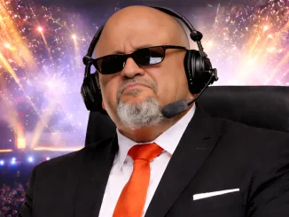 AEW Taz vor einem Feuerwerk auf der Stage