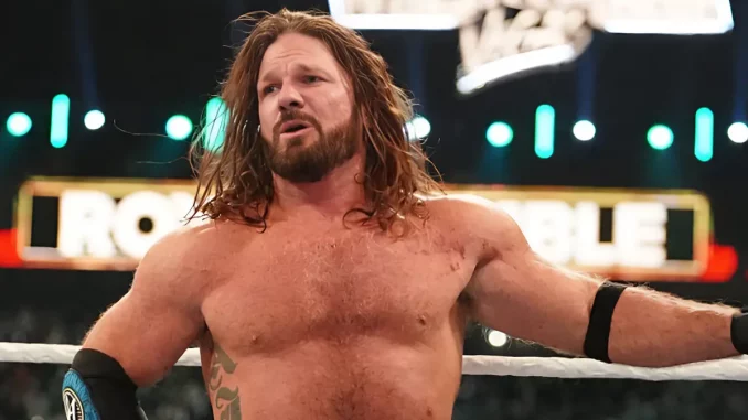 AJ Styles steht nachdenklich im Ring