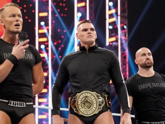 Gunther mit Ludwig Kaiser und Giovanni Vinci als Imperium im Ring
