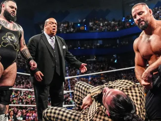 The Vision vor dem abgefertigten Seth Rollins